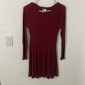 Francesca’s red sweater dress with elbow patches